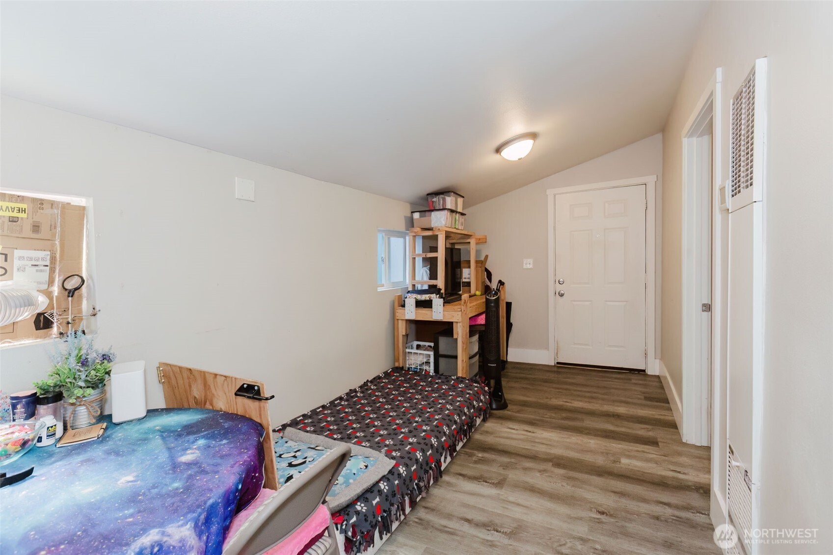 2824 Robin Avenue Bremerton, WA 98310 - Photo 25 of 31 a bedroom with furniture and wooden floor