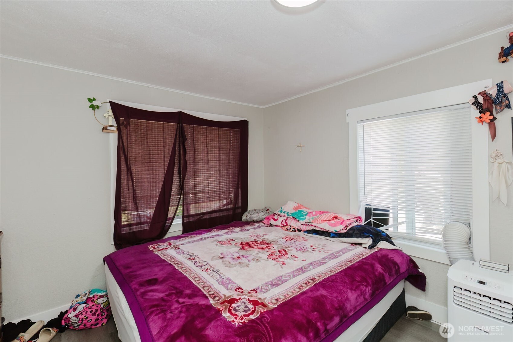 2824 Robin Avenue Bremerton, WA 98310 - Photo 26 of 31 a bed sitting in a bedroom next to a window