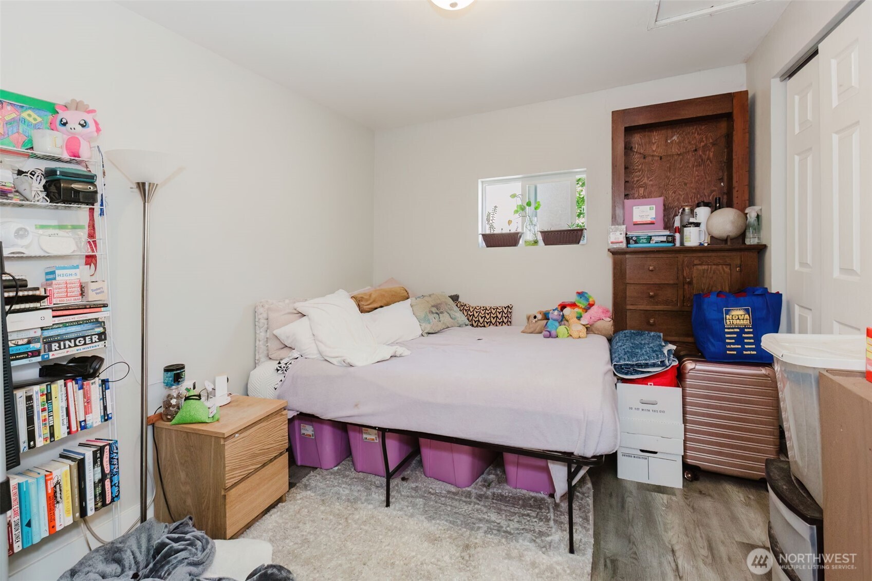 2824 Robin Avenue Bremerton, WA 98310 - Photo 10 of 31 a room with furniture and book shelf