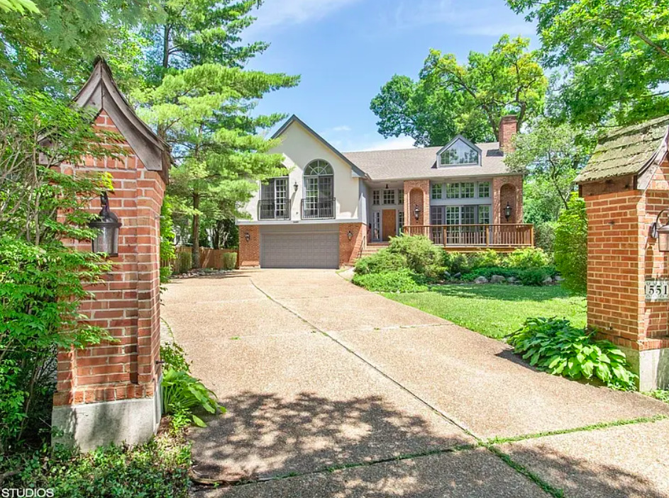 1551 Edgewood Road Lake Forest, IL 60045 - Photo 1 of 16 front view of a house with a yard and potted plants