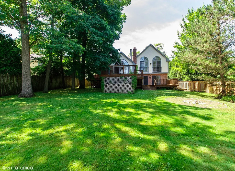 1551 Edgewood Road Lake Forest, IL 60045 - Photo 14 of 16 a front view of a house with yard and green space