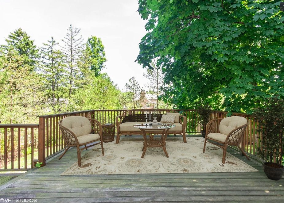 1551 Edgewood Road Lake Forest, IL 60045 - Photo 15 of 16 a view of a chairs and fire pit in the patio