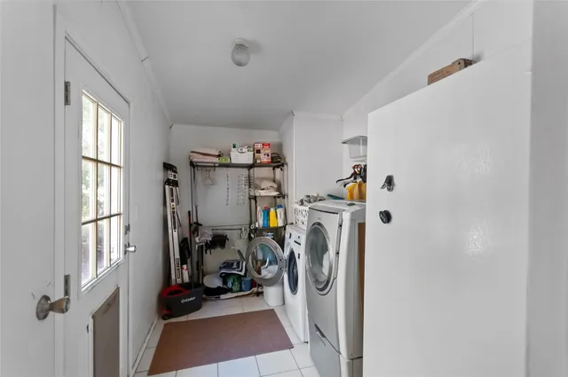 a view of a livingroom with storage and utility