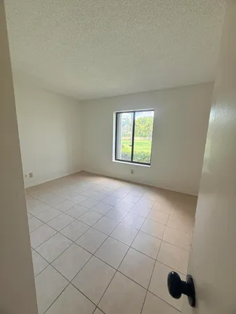 $1,800 | 703 Sunny Pine Way, Unit C1, Greenacres, FL 33415