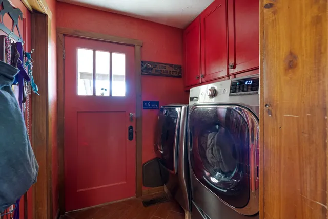 a work room with furniture and wooden floor
