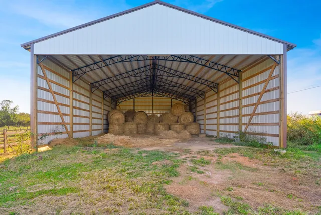 an aerial view of a golf course with outdoor space