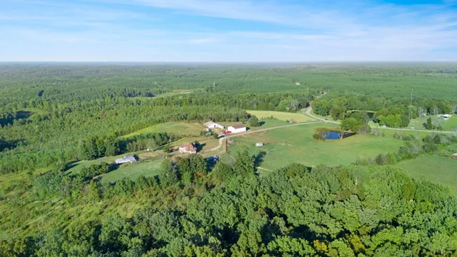 a view of a lake with a yard