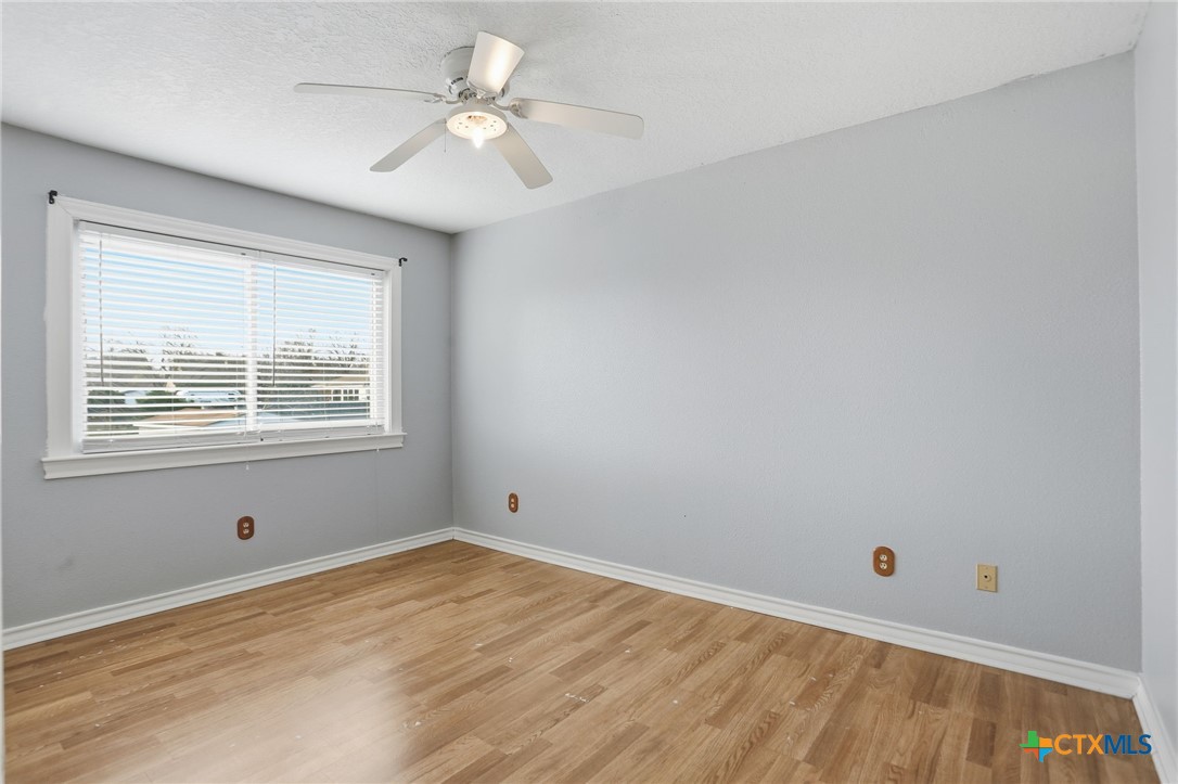 119 Primrose Drive Kyle, TX 78640 - Photo 24 of 30 a view of an empty room with a window