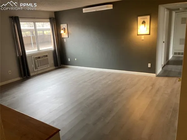 an empty room with windows