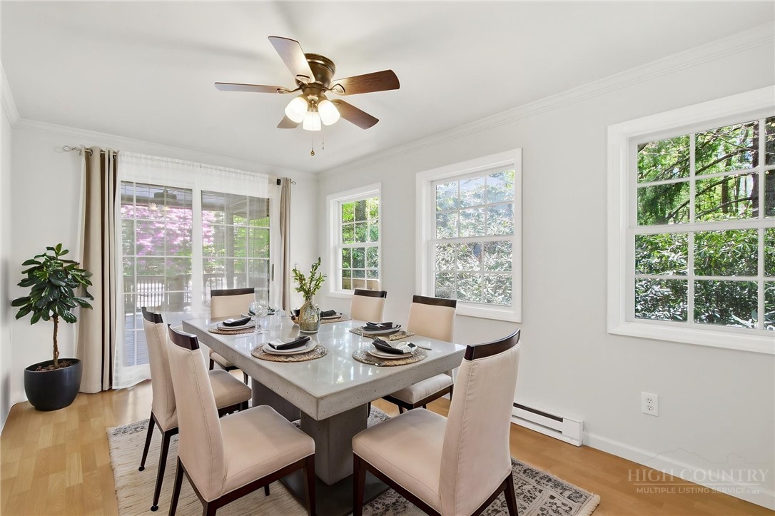 164 Rocky Meadows Road Newland, NC 28657 - Photo 27 of 49 a view of a dining room with furniture window and outside view