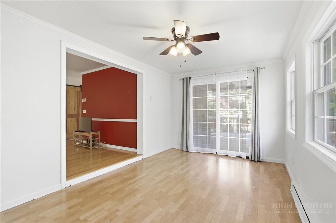164 Rocky Meadows Road Newland, NC 28657 - Photo 30 of 49 wooden floor in an empty room with a window