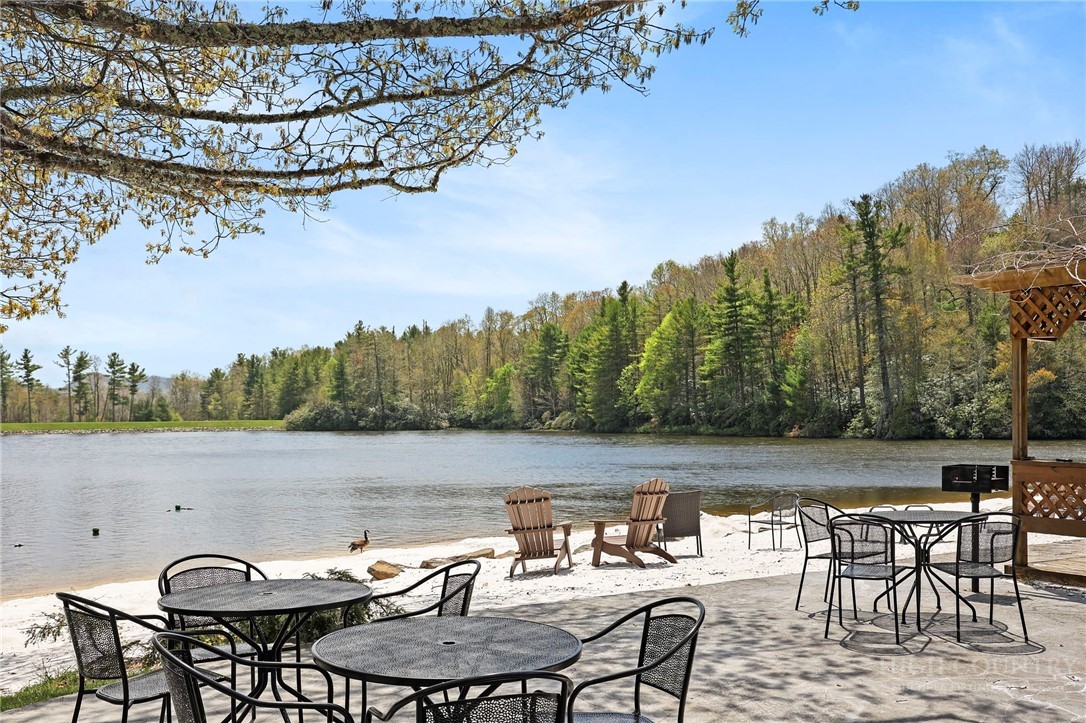 164 Rocky Meadows Road Newland, NC 28657 - Photo 49 of 49 a view of a lake with furniture