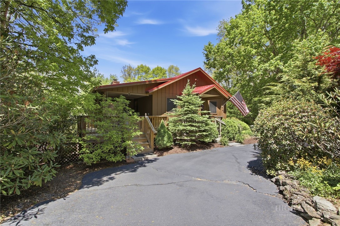 164 Rocky Meadows Road Newland, NC 28657 - Photo 5 of 49 front view of a house with a yard