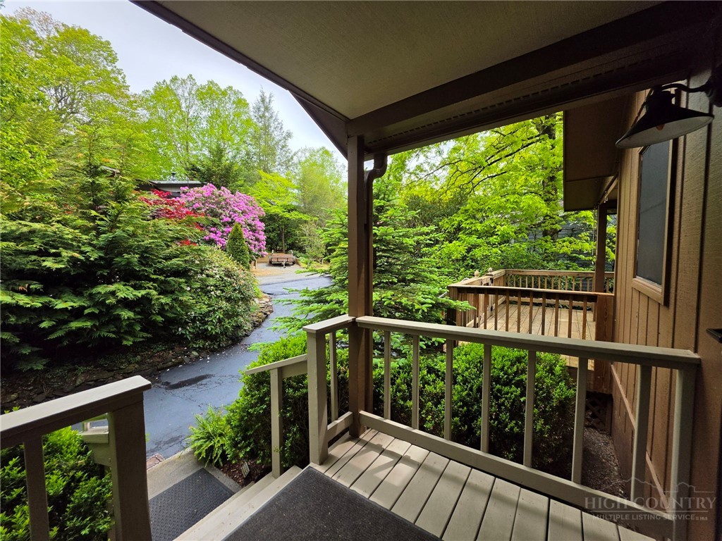 164 Rocky Meadows Road Newland, NC 28657 - Photo 7 of 49 a view of a balcony with wooden floor
