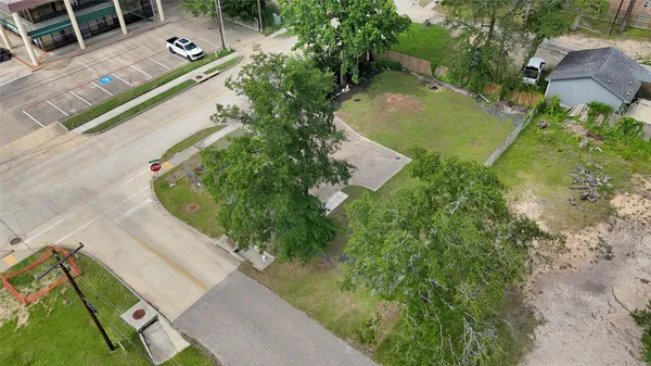 an aerial view of a house with a garden