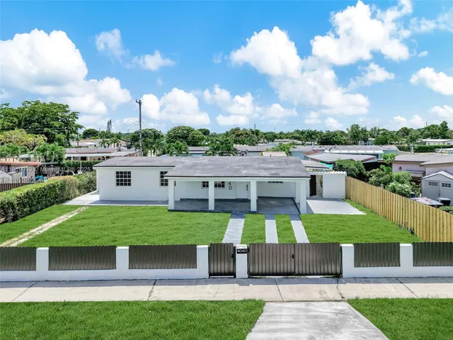 a house view with a garden space