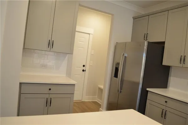 a bathroom with a bathtub and a sink