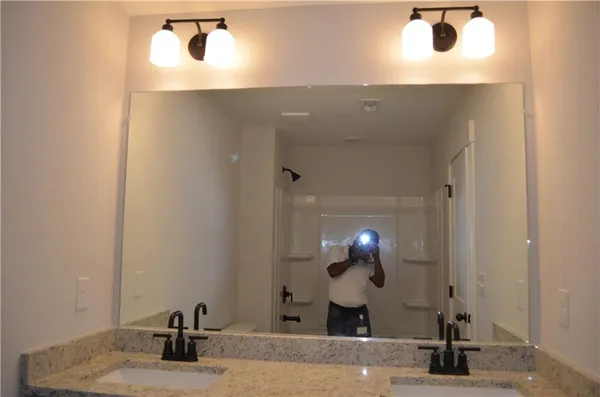 a bathroom with a sink and a toilet