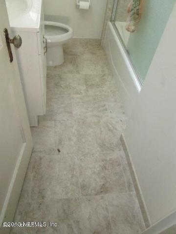 4727 Birkenhead Road Jacksonville, FL 32210 - Photo 6 of 13 a bathroom with a shower