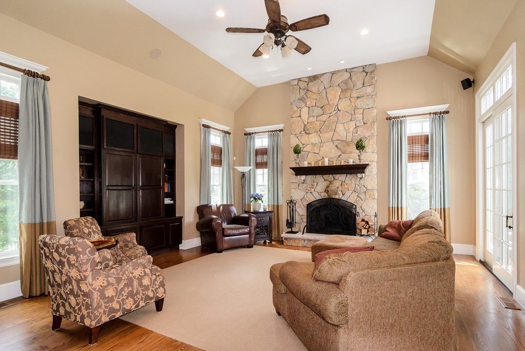 33 Rutgers Road Wellesley, MA 02481 - Photo 7 of 13 a living room with furniture and a fireplace