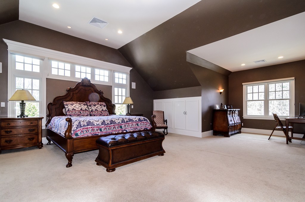 33 Rutgers Road Wellesley, MA 02481 - Photo 8 of 13 a bedroom with a bed and large windows