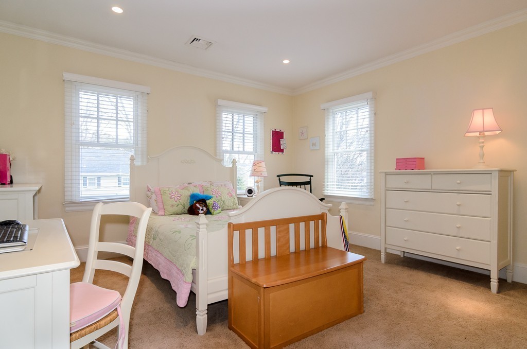 33 Rutgers Road Wellesley, MA 02481 - Photo 9 of 13 a bedroom with furniture and a window