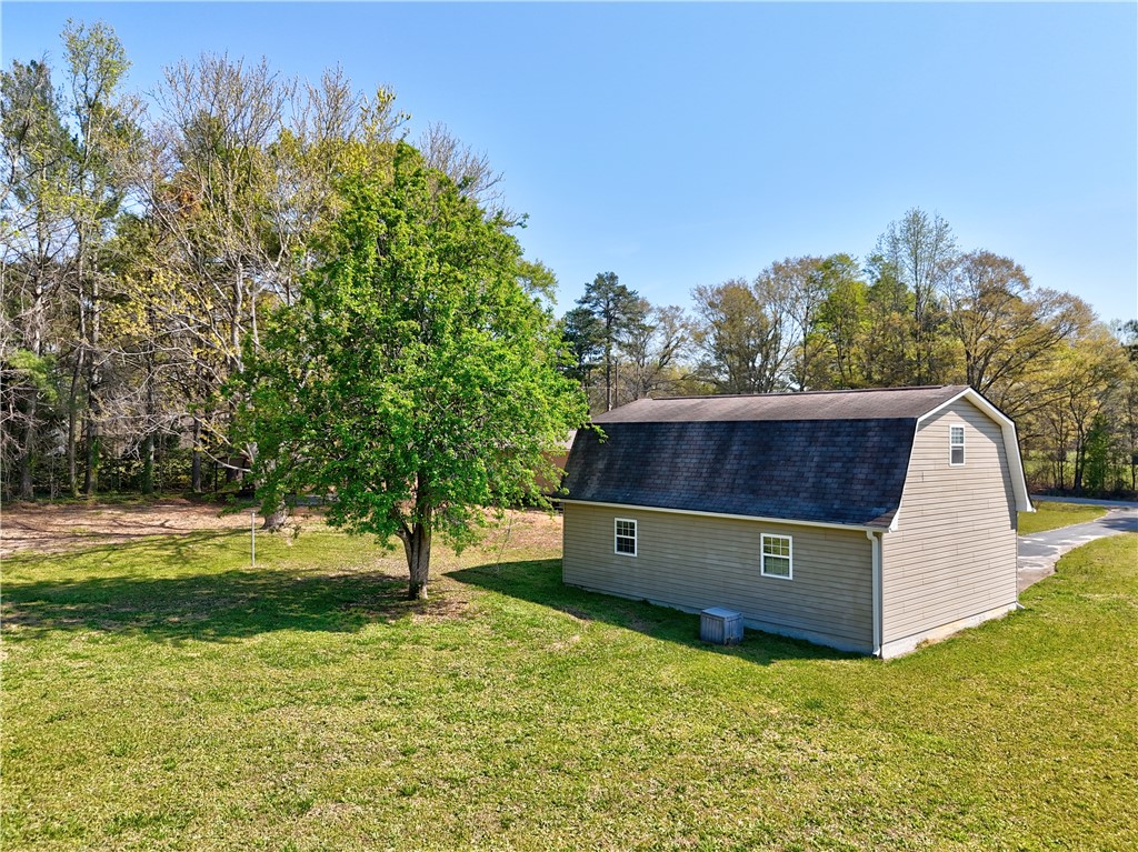 220 Bill Kay Road Belton, SC 29627 - Photo 21 of 30 This tranquil yard features a separate outbuilding, perfect for various uses.