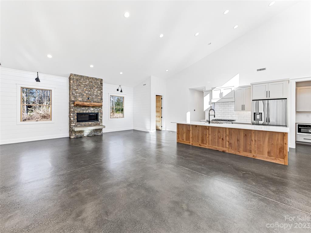 13 Small Crk Road Brevard, NC 28712 - Photo 11 of 48 a view of kitchen with furniture and wooden floor