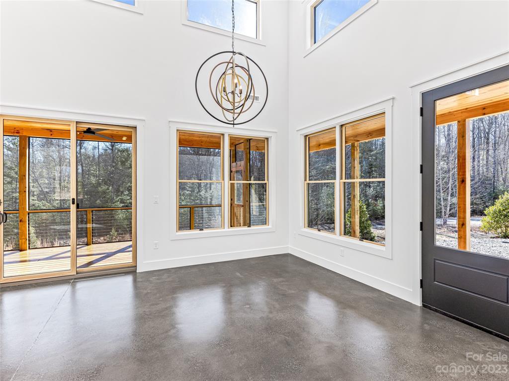 13 Small Crk Road Brevard, NC 28712 - Photo 16 of 48 a view of an empty room with a window