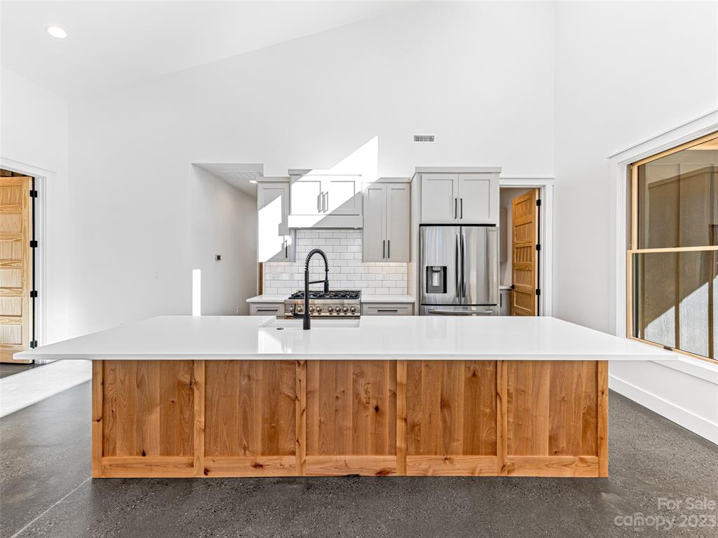13 Small Crk Road Brevard, NC 28712 - Photo 22 of 48 a bathroom with a granite countertop sink
