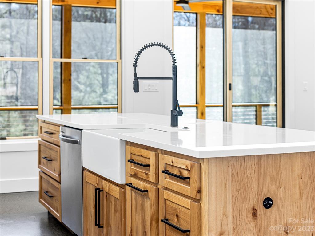 13 Small Crk Road Brevard, NC 28712 - Photo 23 of 48 a kitchen with a sink and a large window