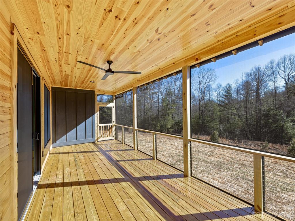 13 Small Crk Road Brevard, NC 28712 - Photo 30 of 48 a view of a balcony with wooden floor