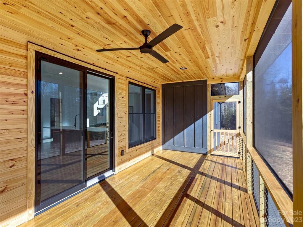13 Small Crk Road Brevard, NC 28712 - Photo 32 of 48 a view of balcony with wooden floor