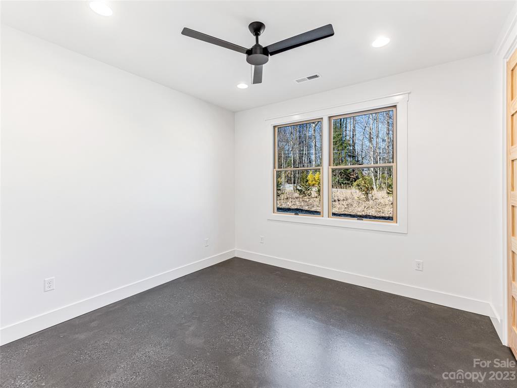 13 Small Crk Road Brevard, NC 28712 - Photo 41 of 48 an empty room with a window