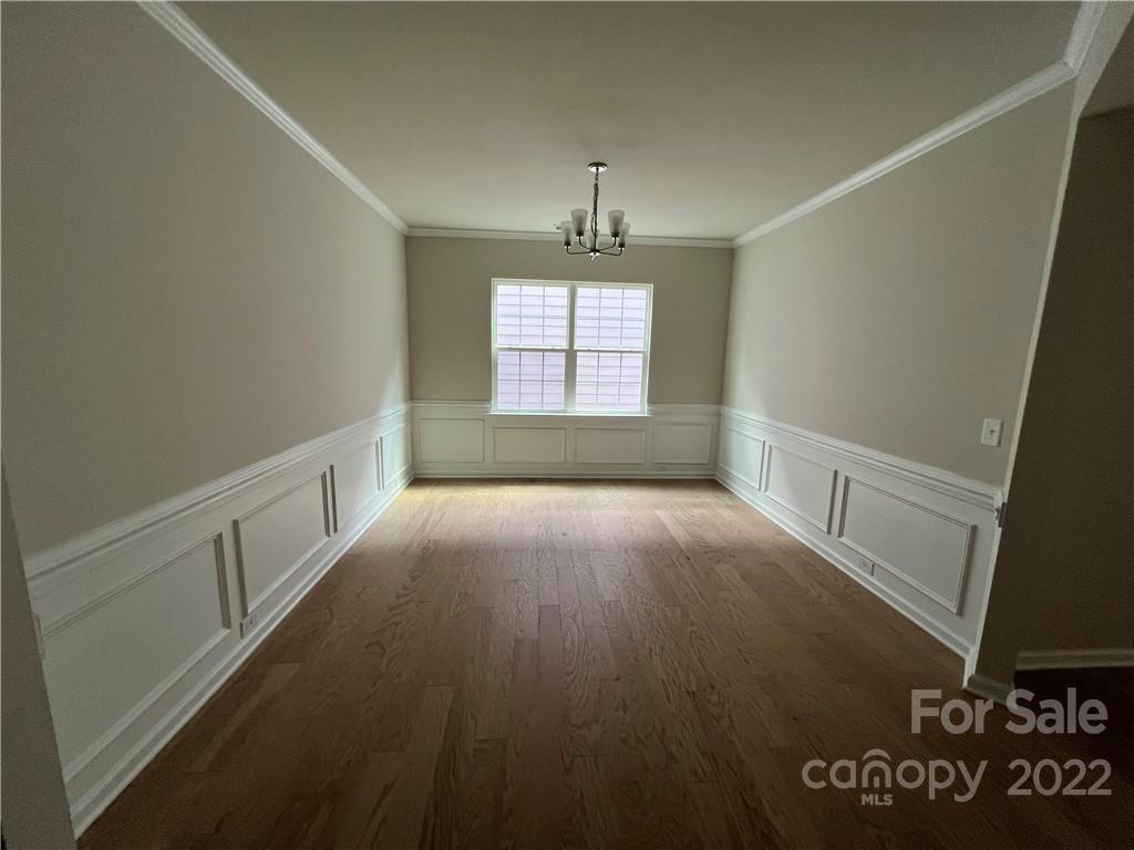 3137 Windhaven Lane, Unit 76 Tega Cay, SC 29708 - Photo 5 of 15 a view of an empty room and window