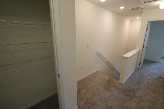 a view of hallway with stairs