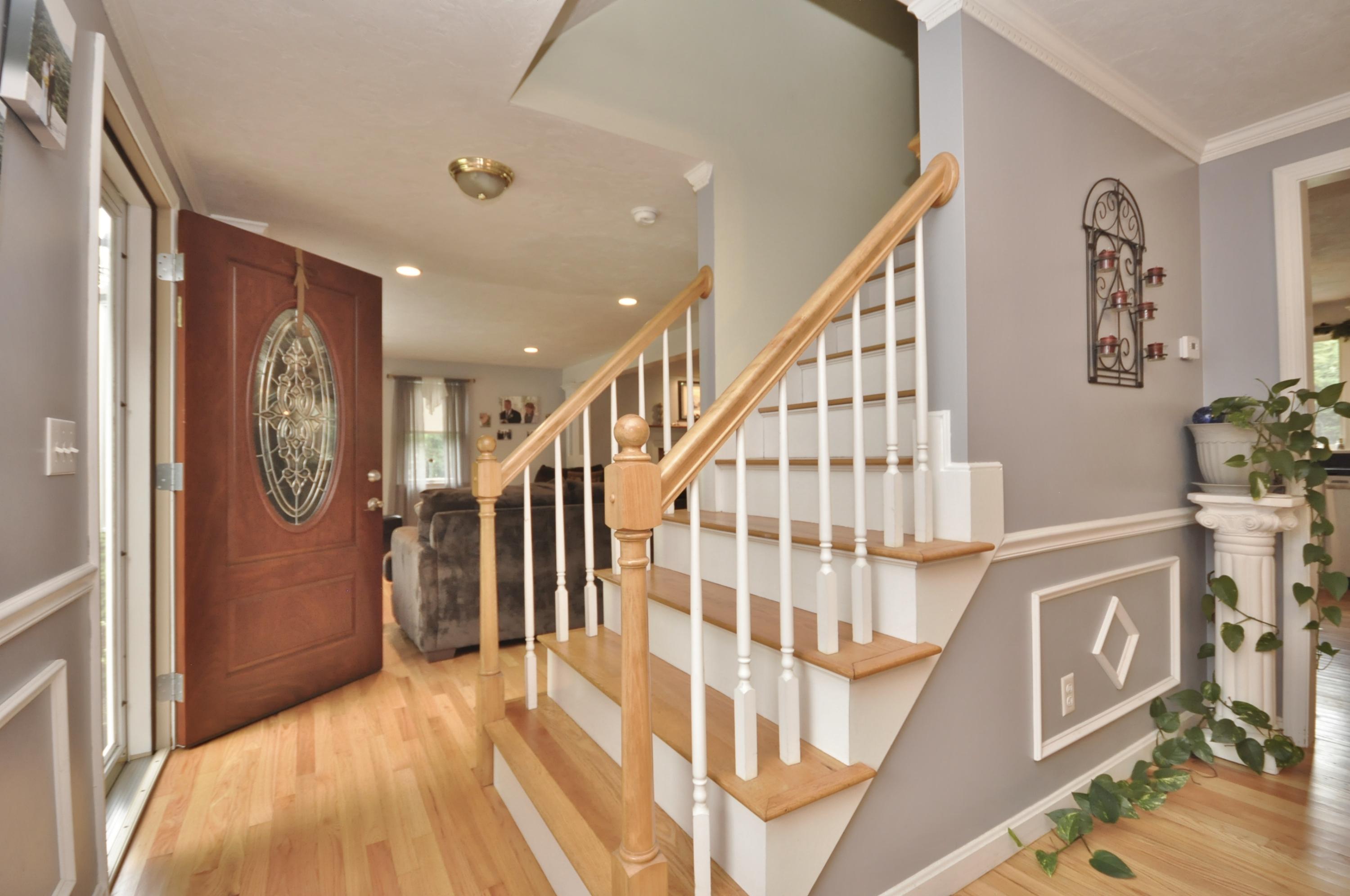 29 Swift Road Sagamore Beach, MA 02562 - Photo 15 of 34 a view of entryway with stairs and wooden floor