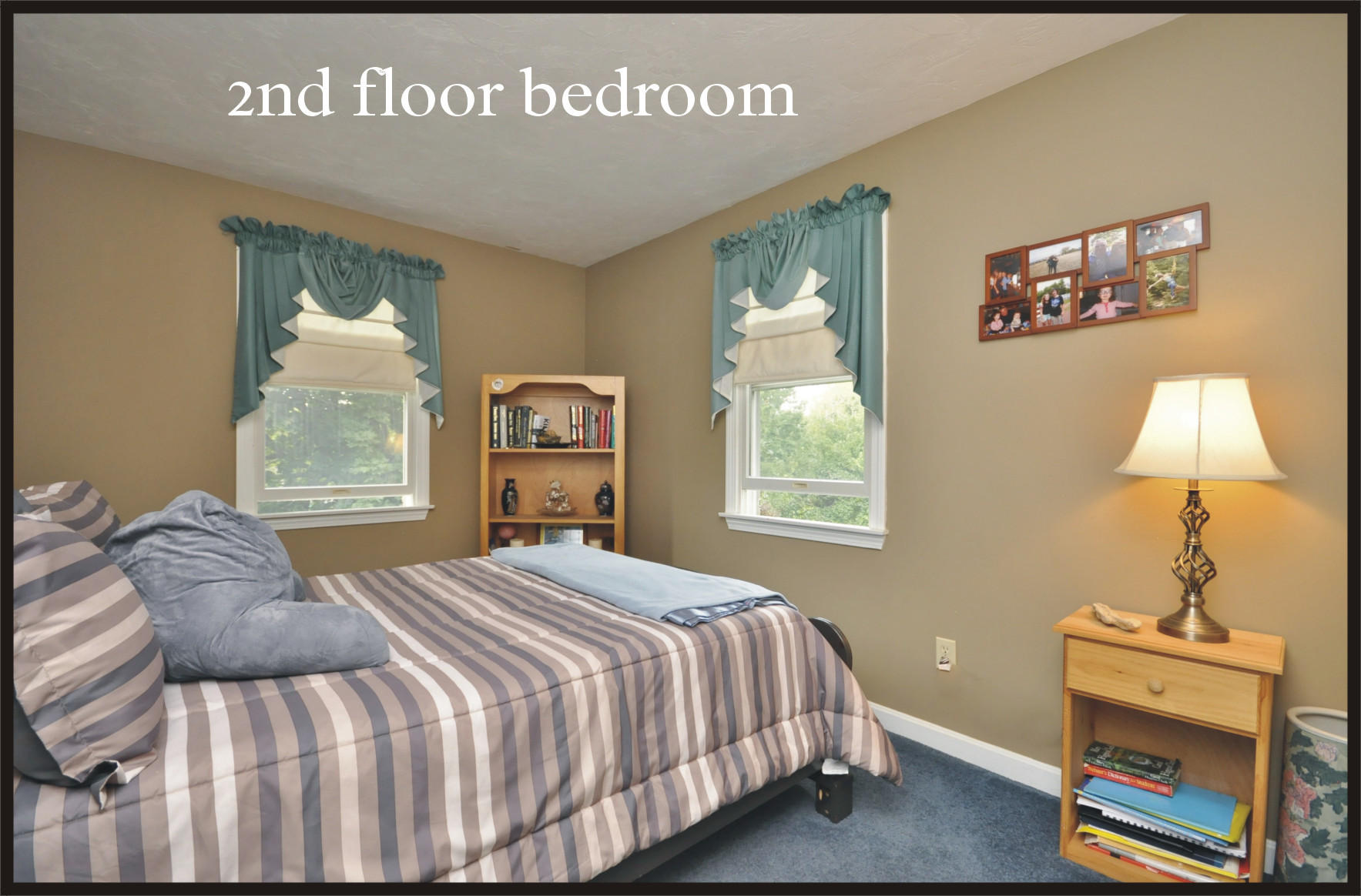 29 Swift Road Sagamore Beach, MA 02562 - Photo 19 of 34 a bedroom with a bed and a window