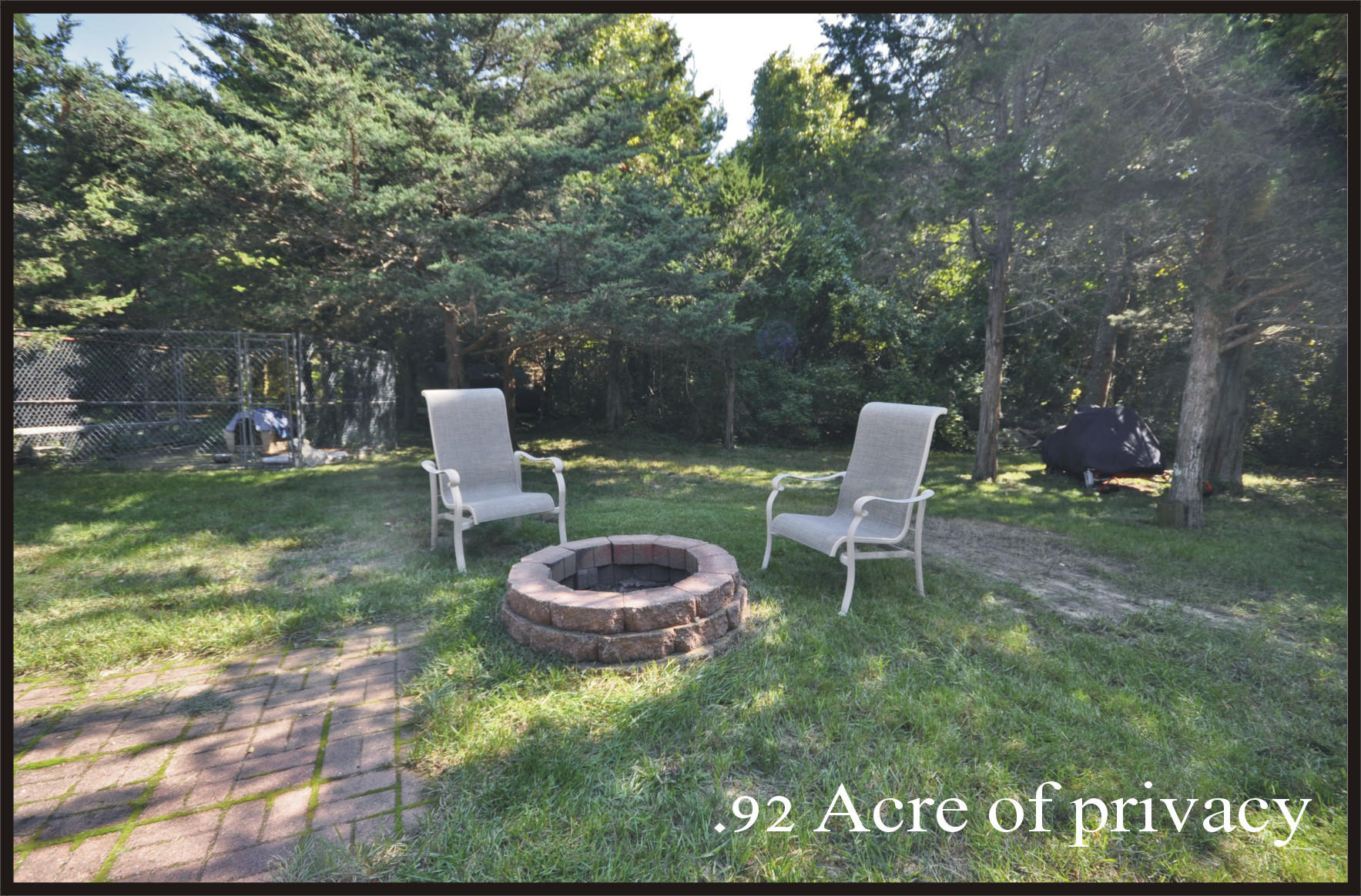 29 Swift Road Sagamore Beach, MA 02562 - Photo 26 of 34 a view of a chairs and table in backyard