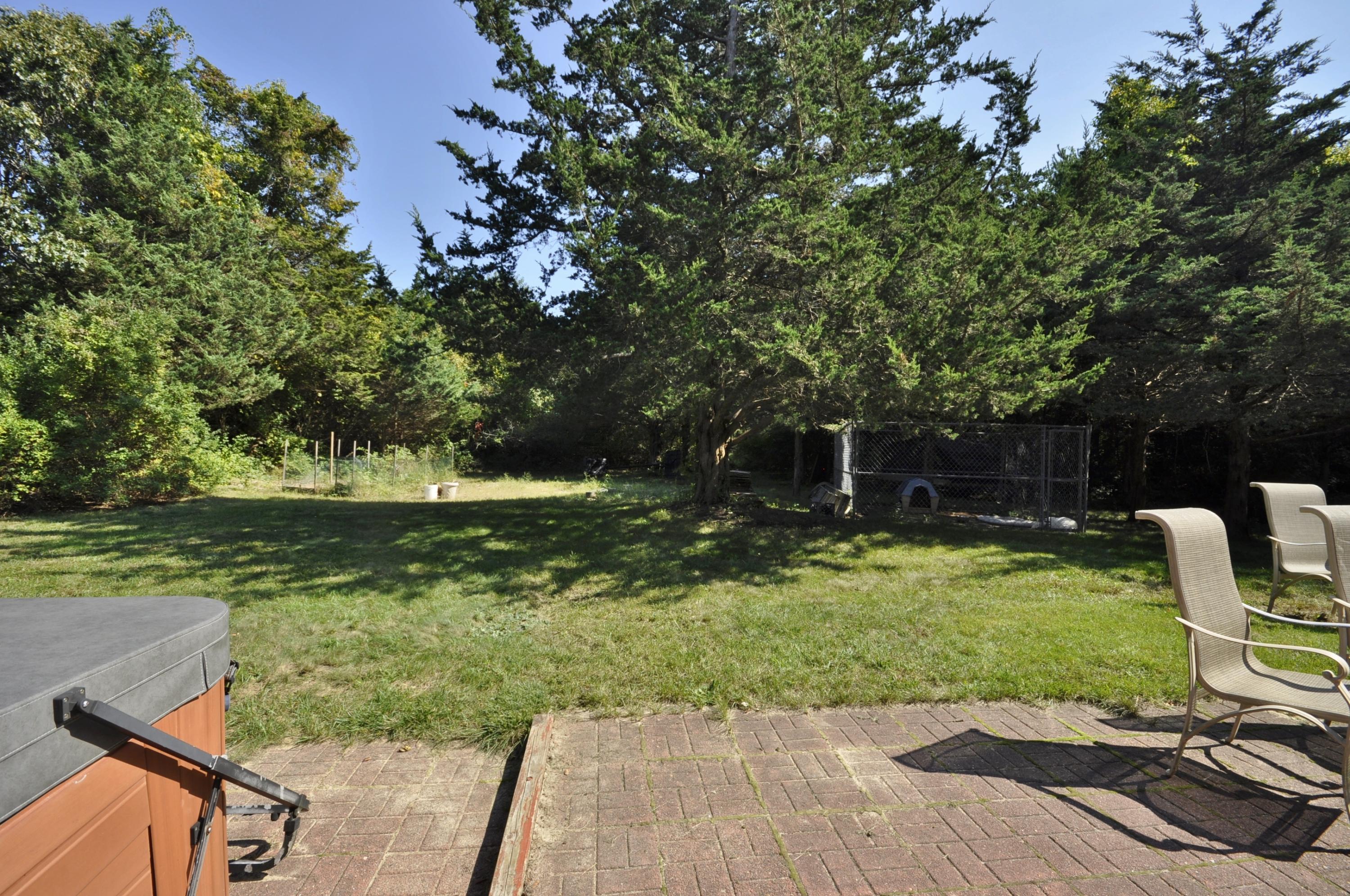 29 Swift Road Sagamore Beach, MA 02562 - Photo 32 of 34 a garden view with a seating space