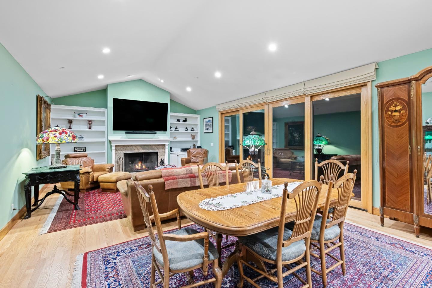 6915 Redwood Retreat Road Gilroy, CA 95020 - Photo 51 of 141 a view of a dining room with furniture window and a fireplace