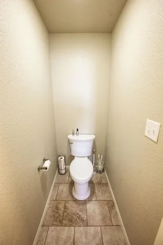 a bathroom with a toilet
