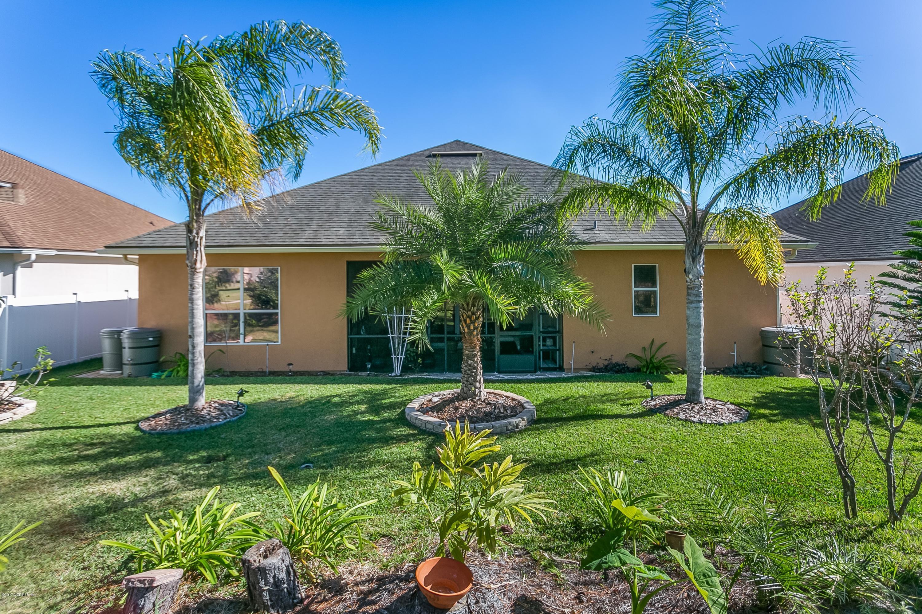 660 Porta Rosa Circle St. Augustine, FL 32092 - Photo 25 of 32 a garden view with a garden