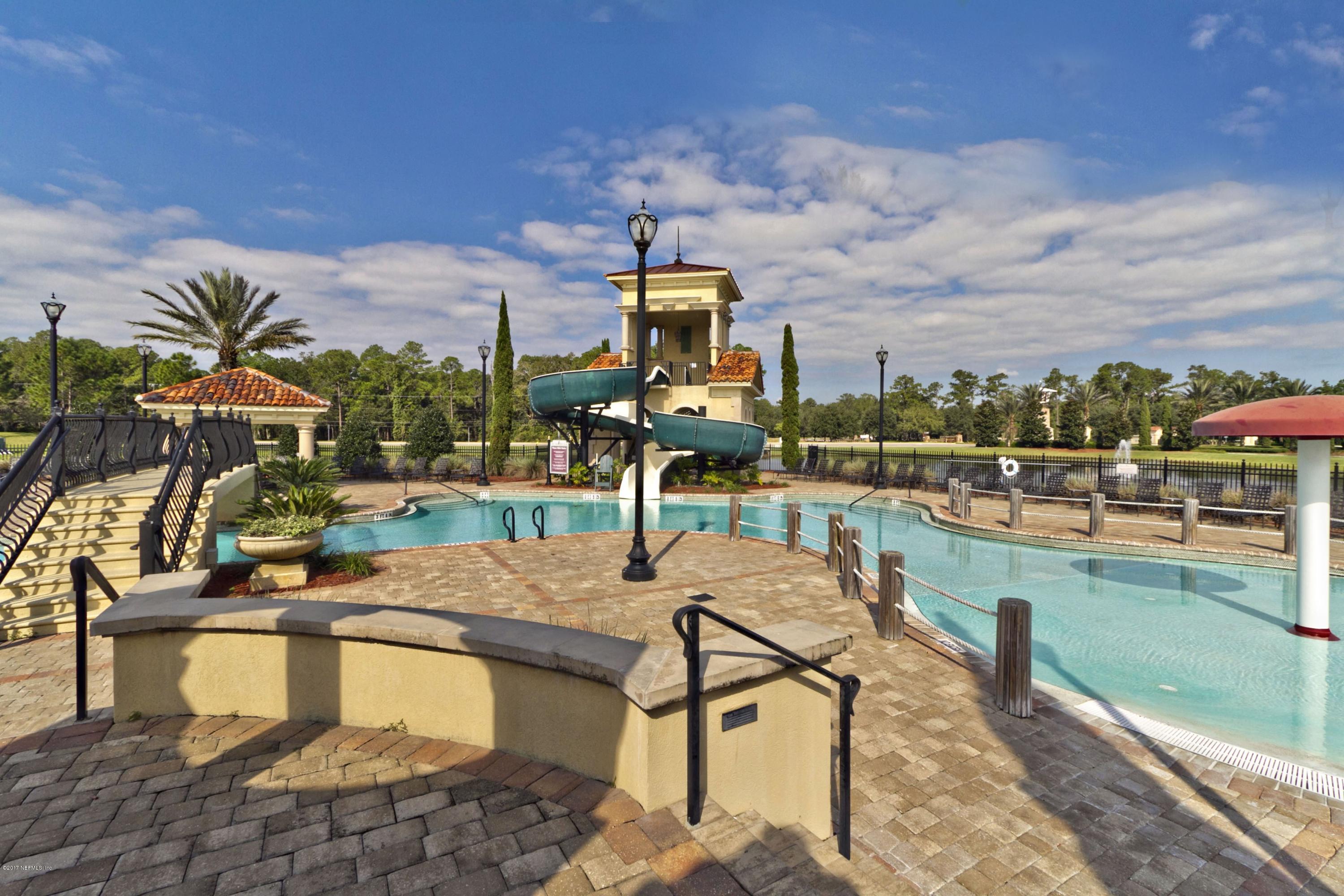 660 Porta Rosa Circle St. Augustine, FL 32092 - Photo 28 of 32 a view of a swimming pool with outdoor seating
