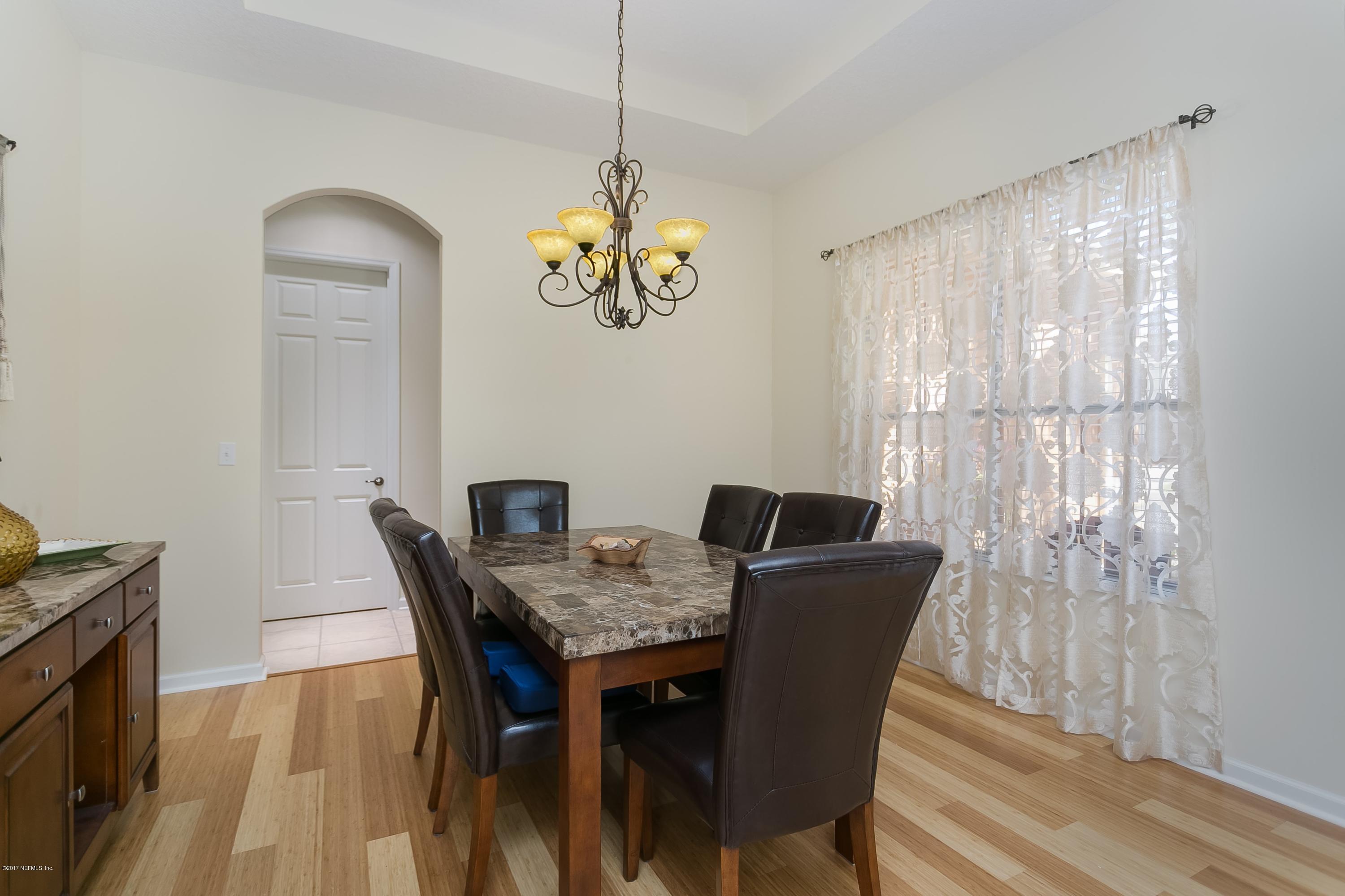 660 Porta Rosa Circle St. Augustine, FL 32092 - Photo 4 of 32 a view of a dining room with furniture window and outside view