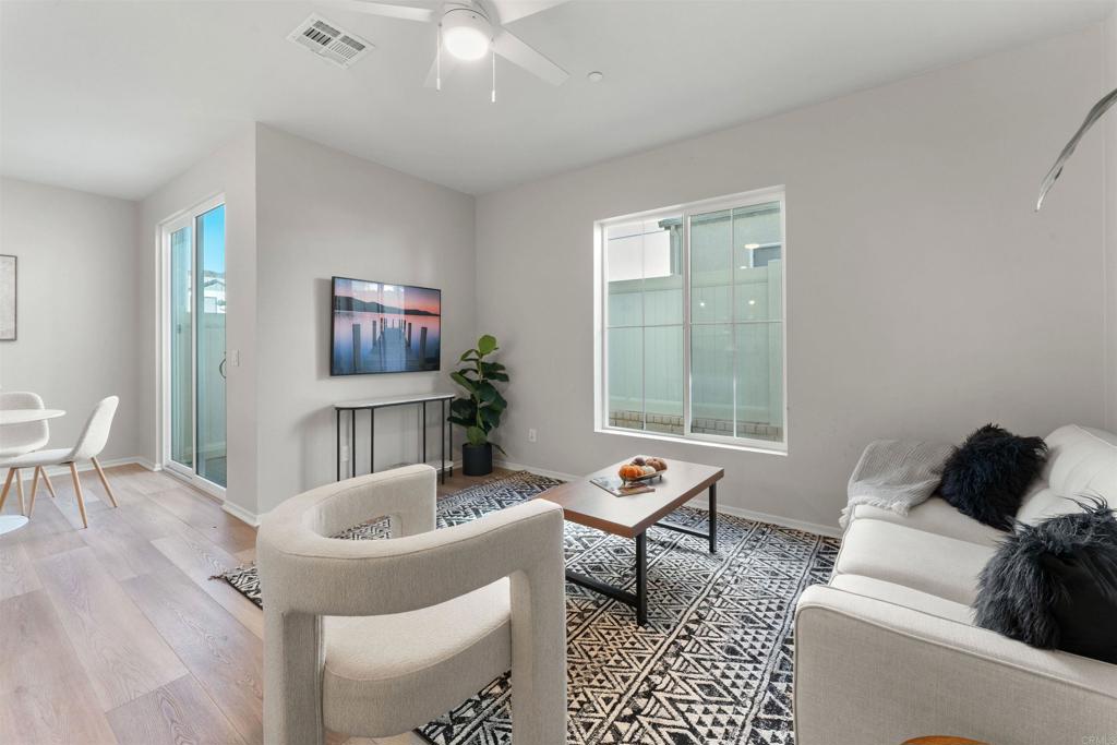 212 Perennial Place Fallbrook, CA 92028 - Photo 11 of 39 a living room with furniture and a window