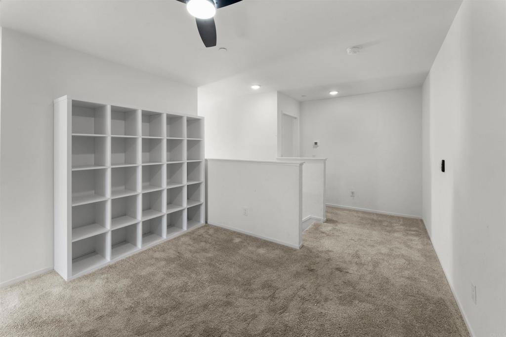 212 Perennial Place Fallbrook, CA 92028 - Photo 15 of 39 an empty room with a empty space and windows