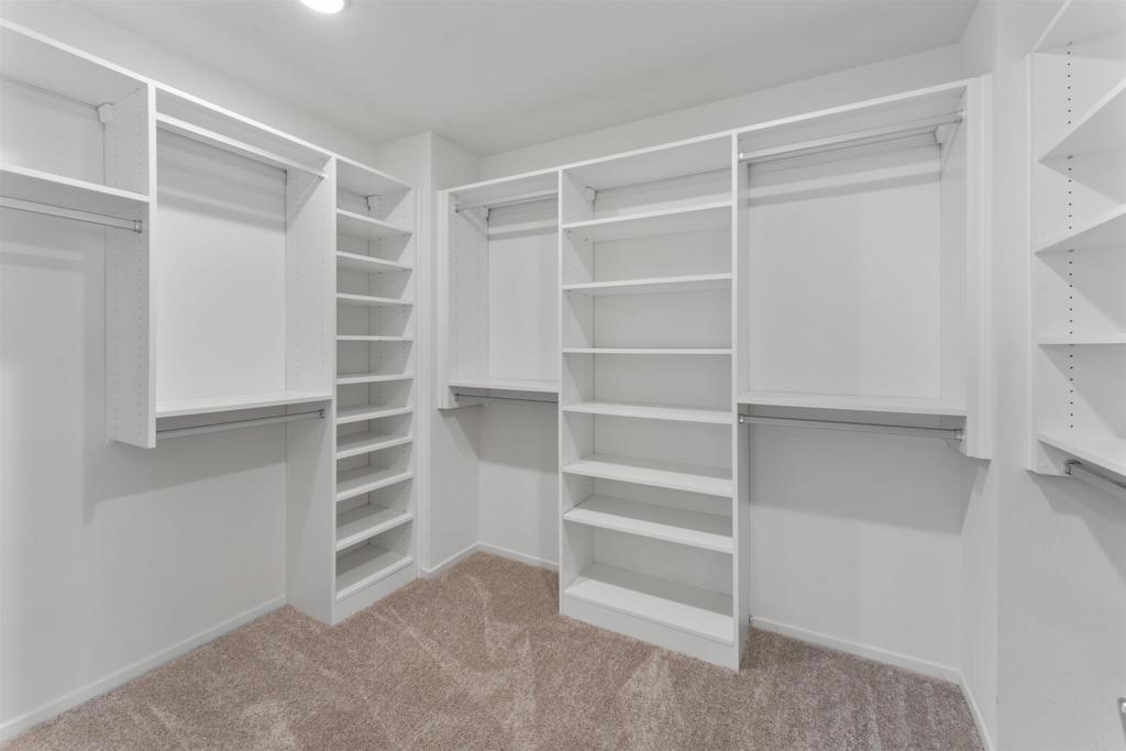 212 Perennial Place Fallbrook, CA 92028 - Photo 20 of 39 a view of walk in closet with empty racks