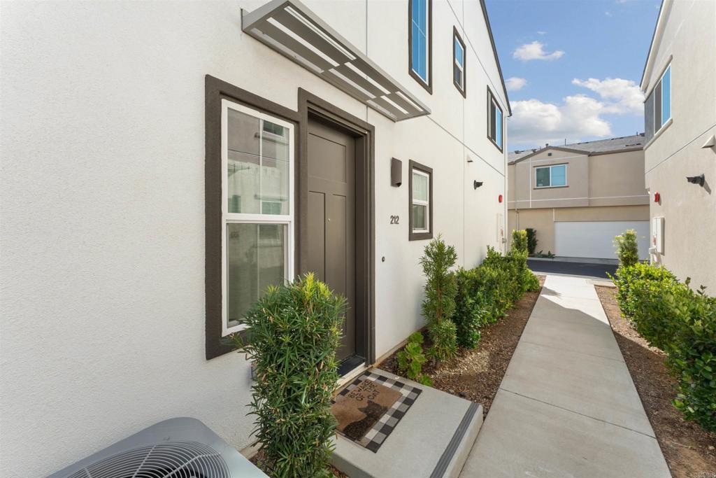212 Perennial Place Fallbrook, CA 92028 - Photo 29 of 39 a view of a house with potted plants