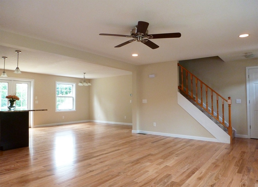 184 Ellsworth Avenue Springfield, MA 01118 - Photo 16 of 25 a view of an empty room with wooden floor and a window